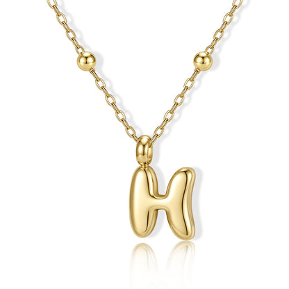 Gold Bubble Initial H Necklace for Women on a white background