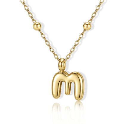 Gold Bubble Initial M Necklace for Women on a white background