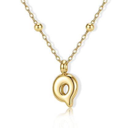 Gold Bubble Initial Q Necklace for Women on a white background