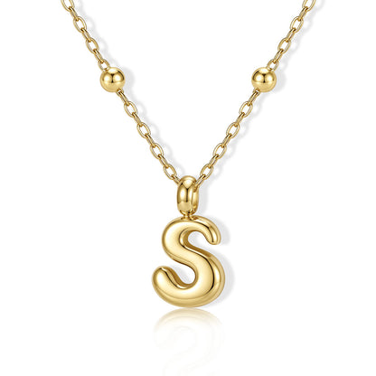Gold Bubble Initial S Necklace for Women on a white background