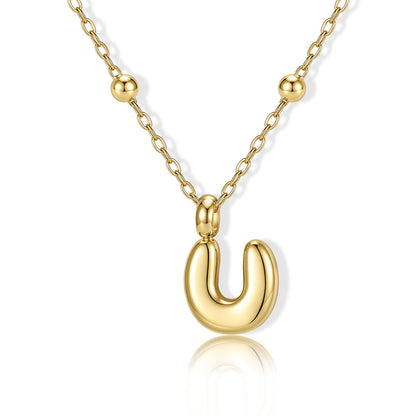 Gold Bubble Initial U Necklace for Women on a white background