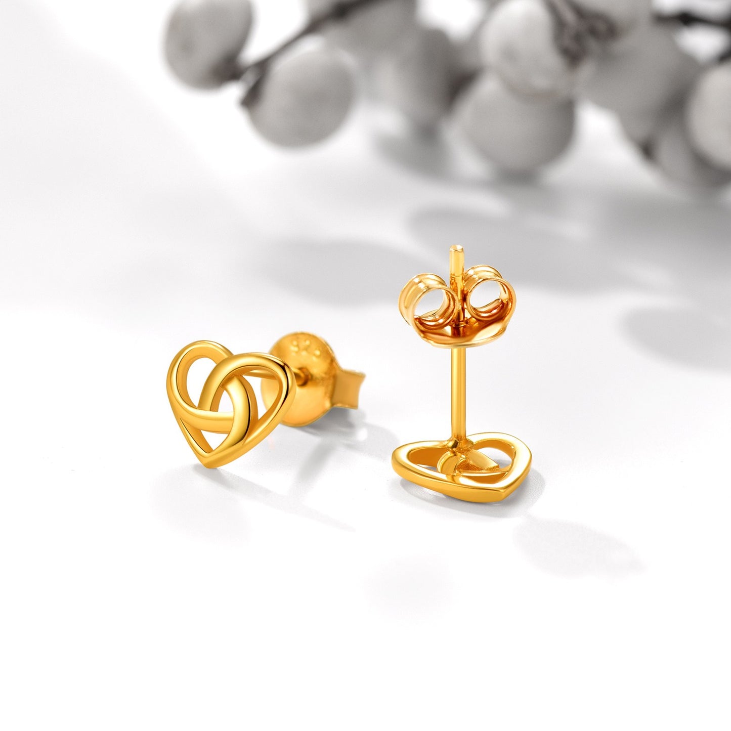 Gold Heart Celtic Knot Stud Earrings on a white background