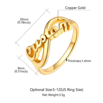 Gold Plated Custom Name Infinity Promise Ring for Women on white stone on a light yellow backgound Dimenion, detail