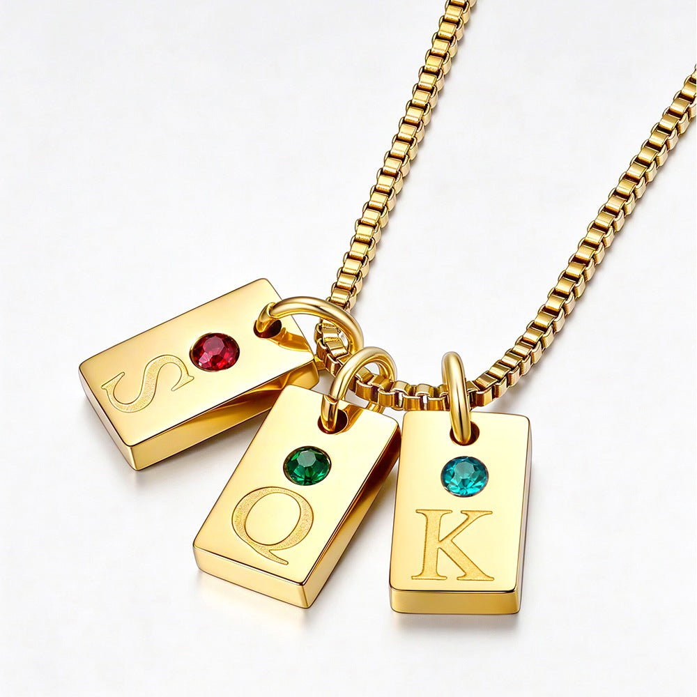 Gold Plated Personalized Initial Birthstone Tag Necklace on a white background