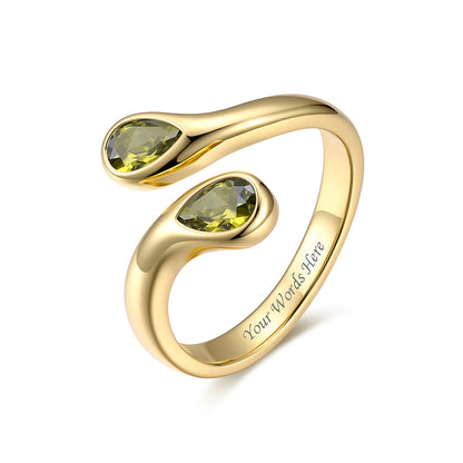 Gold Plated Teardrop August Birthstone Adjustable Ring on a white background