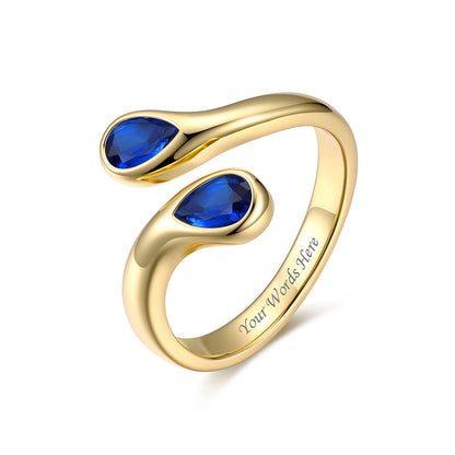Gold Plated Teardrop September Birthstone Adjustable Ring on a white background