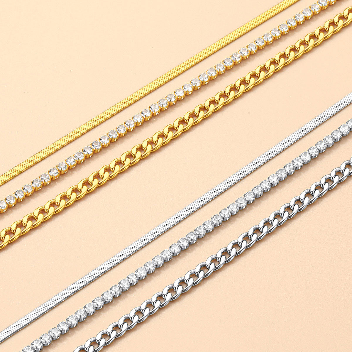 Gold and silver chain ankle bracelet on a beige background