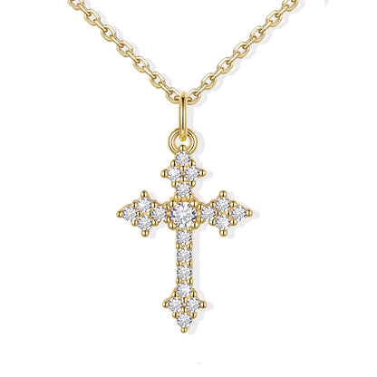 Gold cross pendant necklace with diamonds on a white background