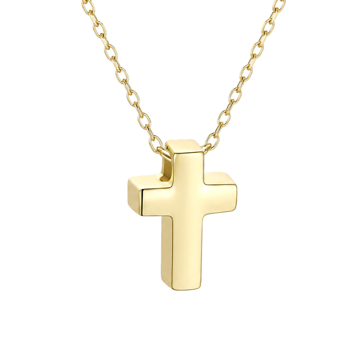 Gold cross pendant on a chain against a white background