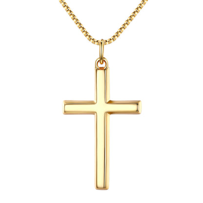 Gold cross pendant on a white background Medium Size