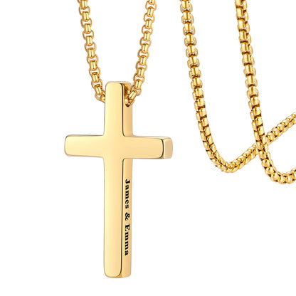 Gold custom engraved cross pendant necklace on a white background
