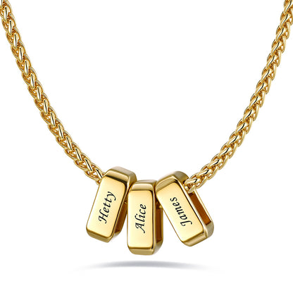 Gold custom name necklace with 3 rectangular pendant engraved on a white background