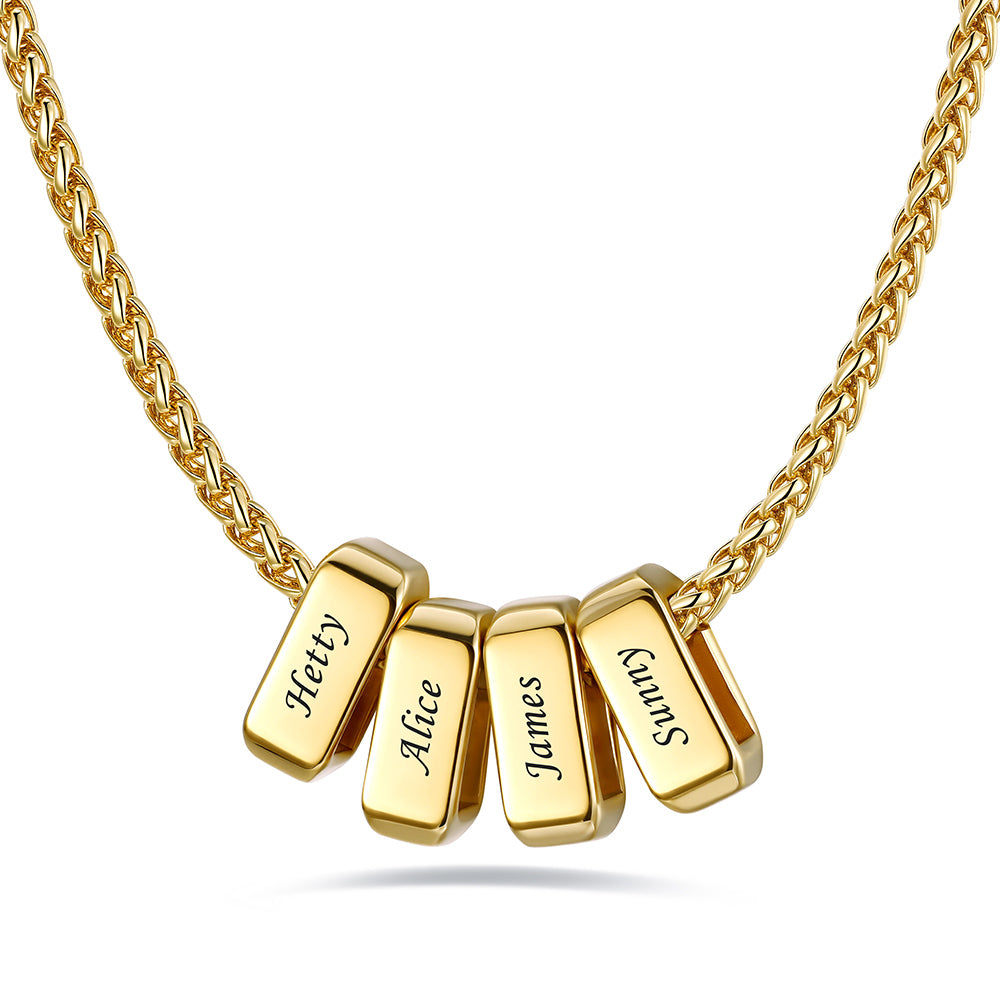 Gold custom name necklace with 4 rectangular pendant engraved on a white background