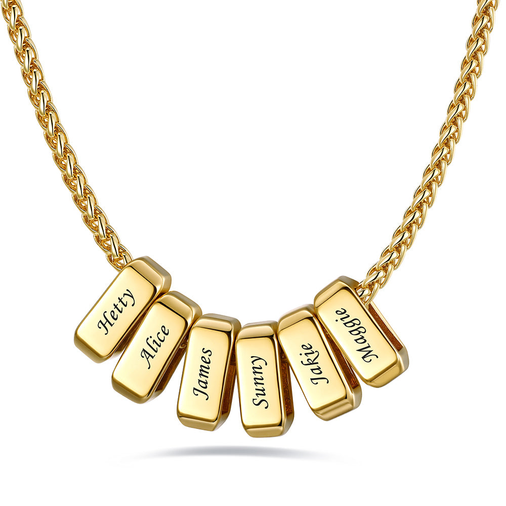 Gold custom name necklace with 6 rectangular pendant engraved on a white background