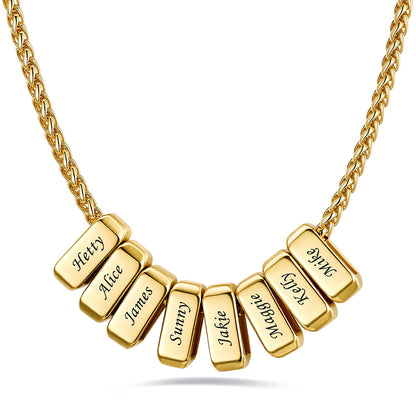 Gold custom name necklace with 8 rectangular pendant engraved on a white background