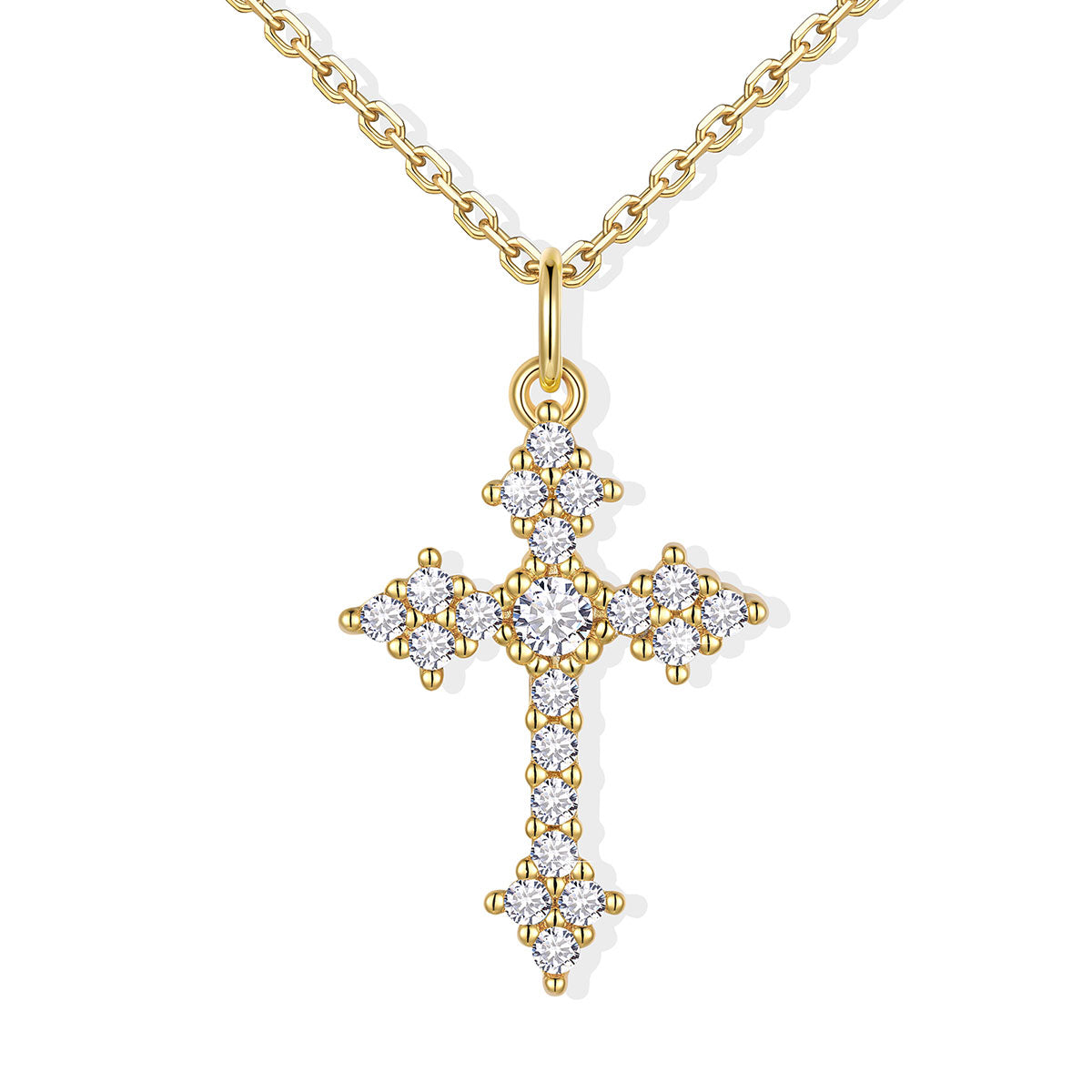 Gold cz cross pendant necklace on a white background