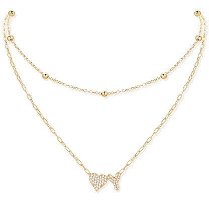 Gold cz initial Y necklace with a heart-shaped pendant on a white background