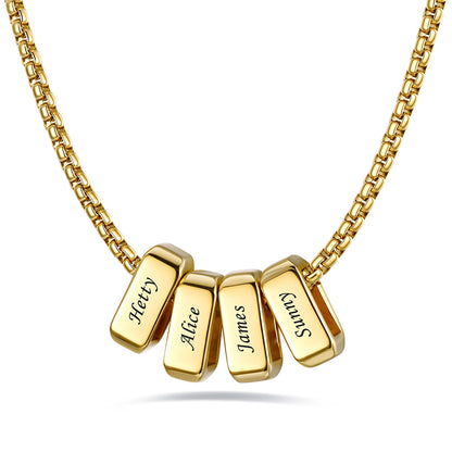 Gold engraved name necklace with 4 name bars on a white background