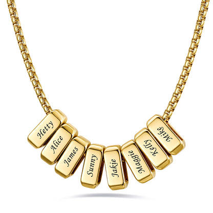 Gold engraved name necklace with 8 name bars on a white background