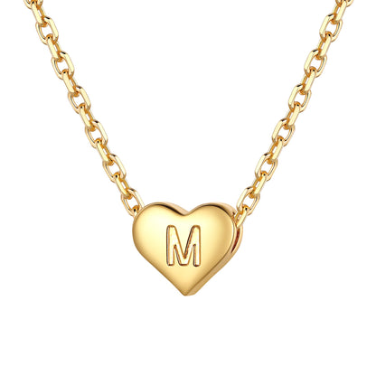 Gold heart initial necklace with an initial 'M' on a white background 