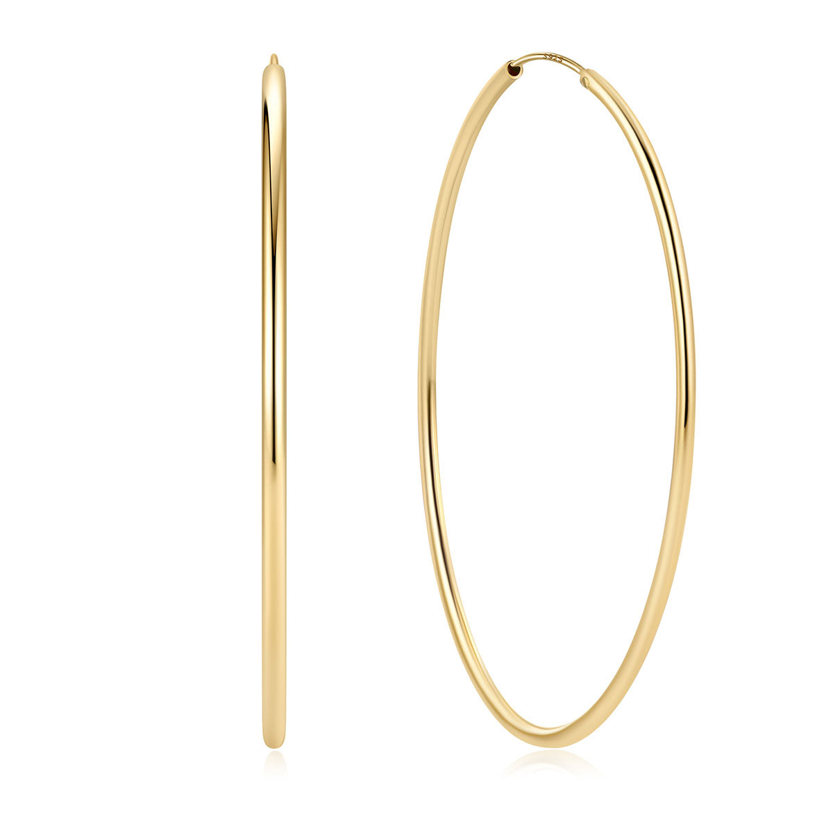 Gold hoop earrings on a white background 70mm 