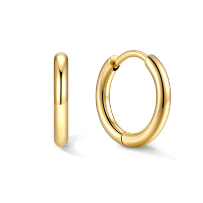 Gold huggie earrings 10mm on a white background