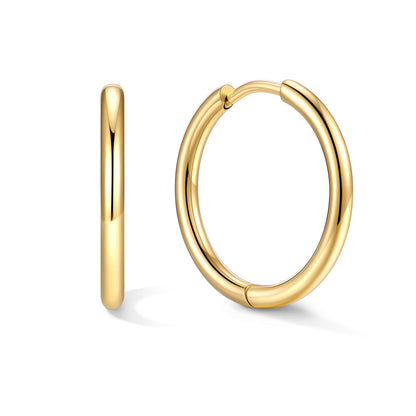 Gold huggie earrings 16mm on a white background