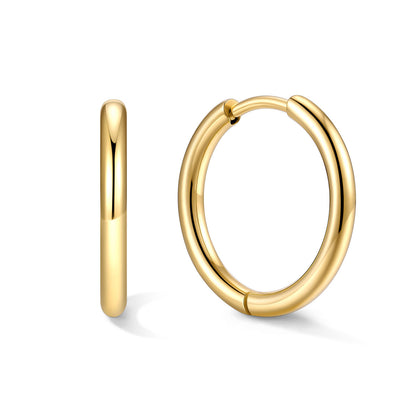 14mm Gold huggie earrings on a white background