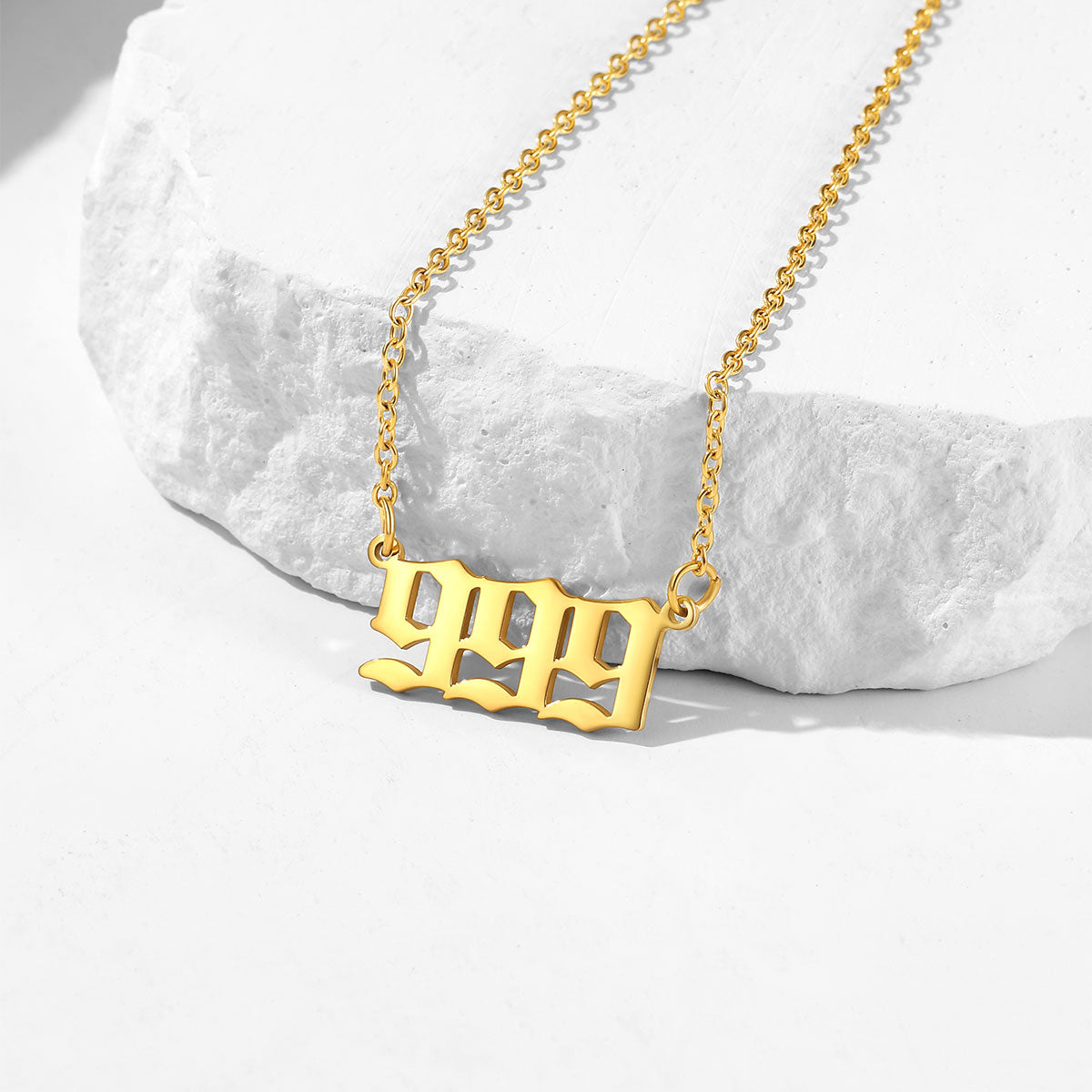 Gold number necklace with a unique pendant