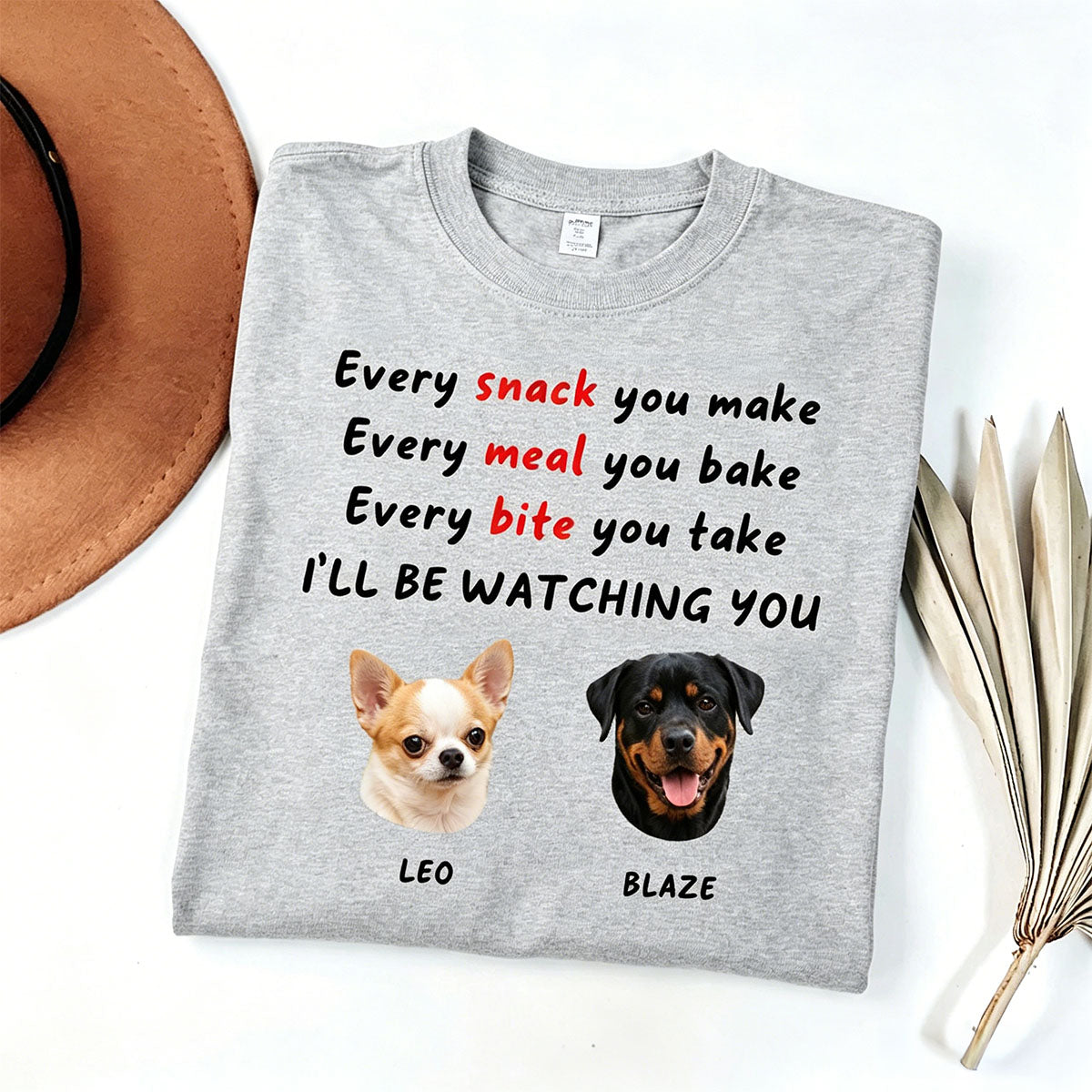 Gray t-shirt with dog-themed text and images on a white background