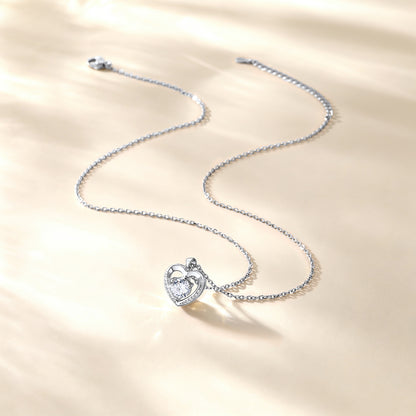 Heart cz necklace on a beige background