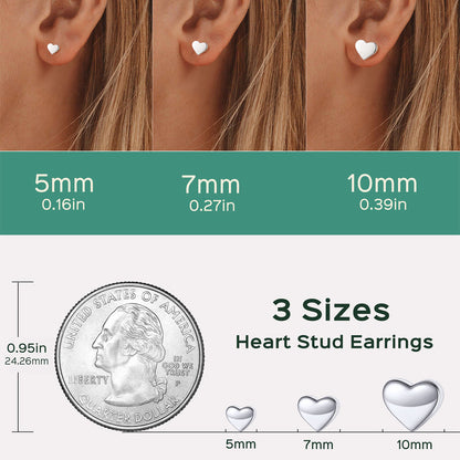Heart stud earrings shown worn on a person's ear, with size comparisons labeled 5mm, 7mm, and 10mm, plus a coin and small heart earring size illustrations.