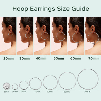 Hoop earrings size guide with measurements on a light pink background