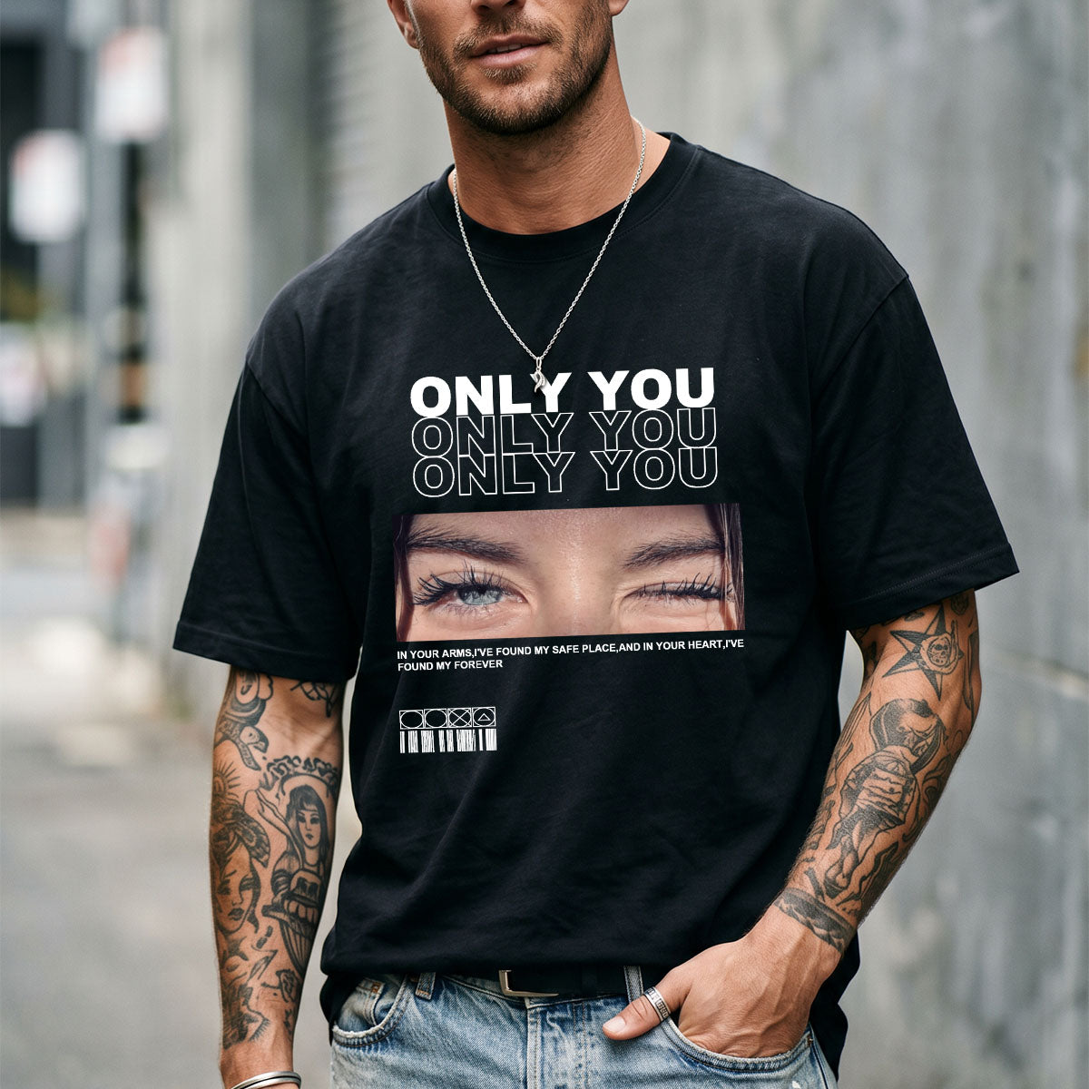 Man wearing a black custom eyes t-shirt with eye-catching design and text.