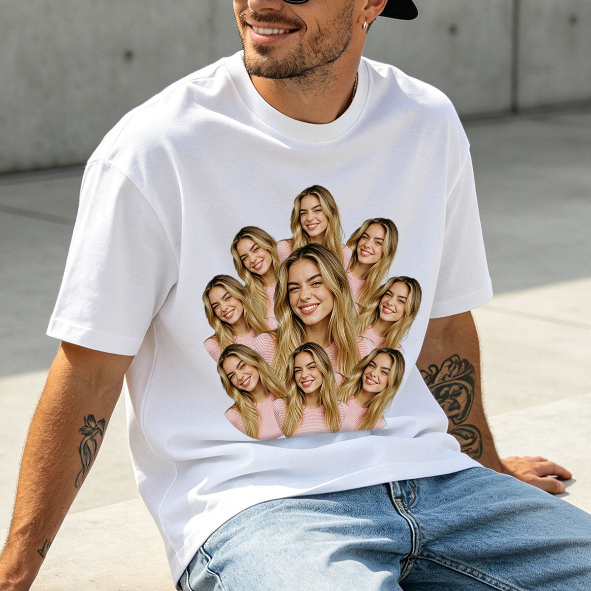 Man wearing a white t-shirt with a graphic of a woman's face repeated