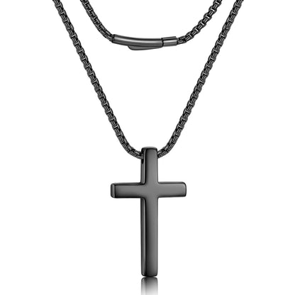 A double-layered black chain necklace with a polished black cross pendant, displayed against a clean white background.