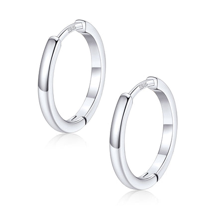 Pair of silver 14mm hoop earrings on a white background