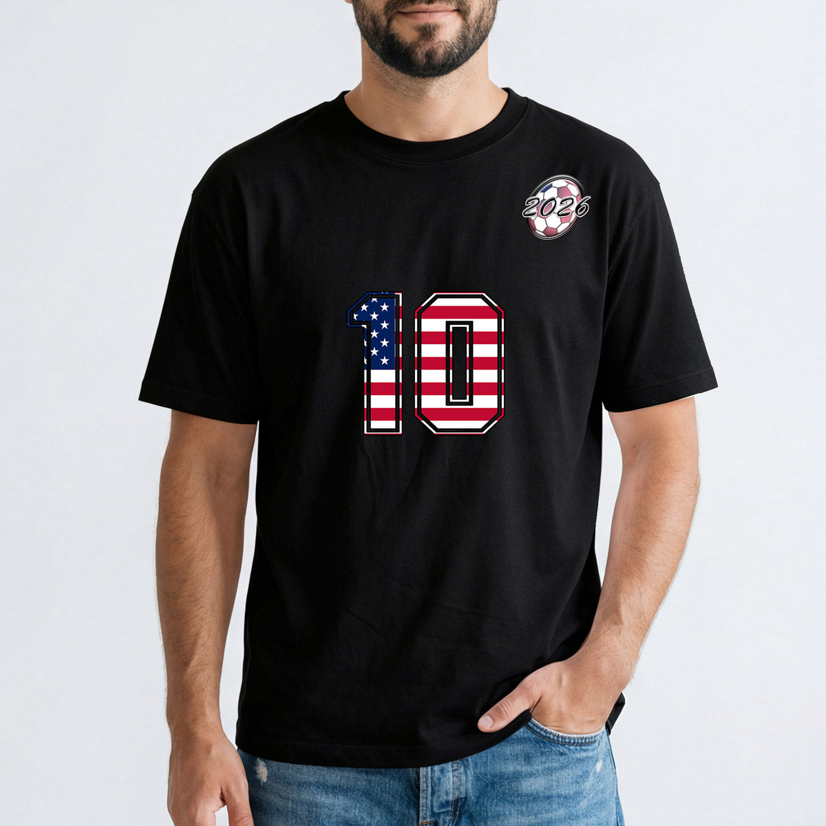 Person wearing a black world cup 2026 soccer t-shirt with a number 10 design on a white background