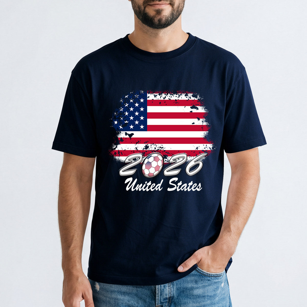 Person wearing a navy blue world cup soccer t-shirt with an American flag and '2026 United States' text on a white background