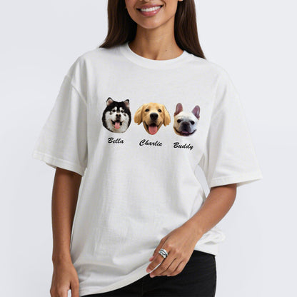 Person wearing a white custom t-shirt with dog illustrations and names on a white background