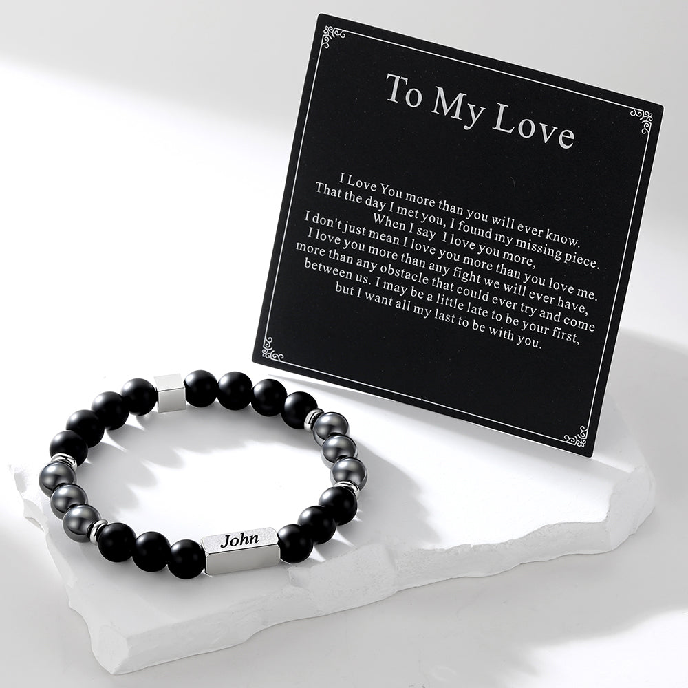 Personalized Magnetic Hematite Beaded Bracelet for Men on a white background with black greeting card