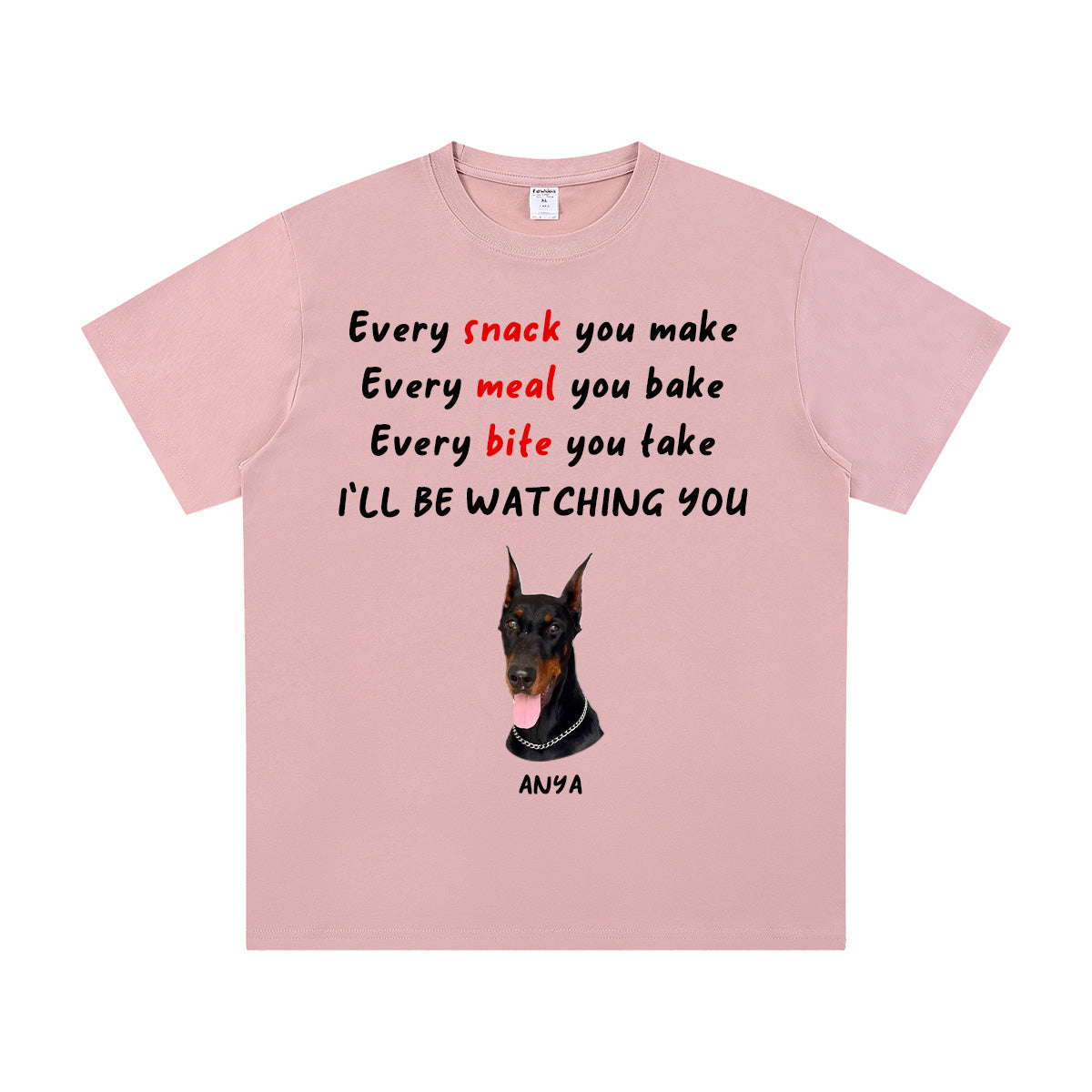 Pink t-shirt with a dog illustration and humorous text on a white background
