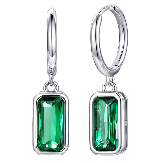 Rectangular Baguette‑Cut May Birthstone Huggie Dangle Earrings on a white background