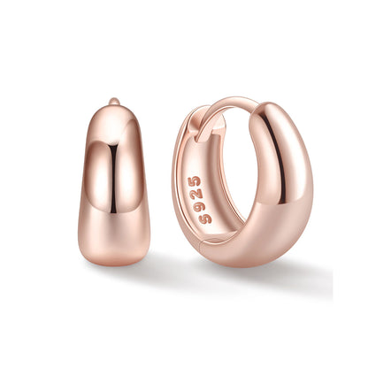 Rose Gold 8mm Chunky huggie earrings on a white background