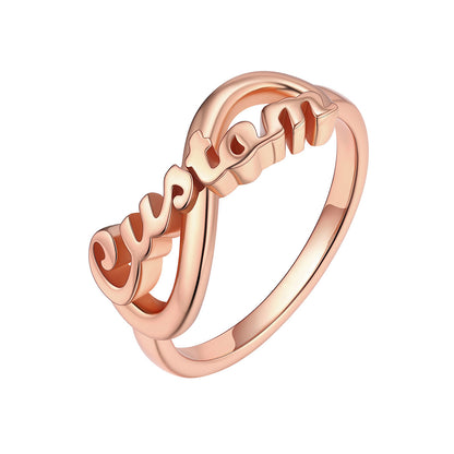 Rose Gold Custom Name Infinity Promise Ring for Women on white stone on a white background
