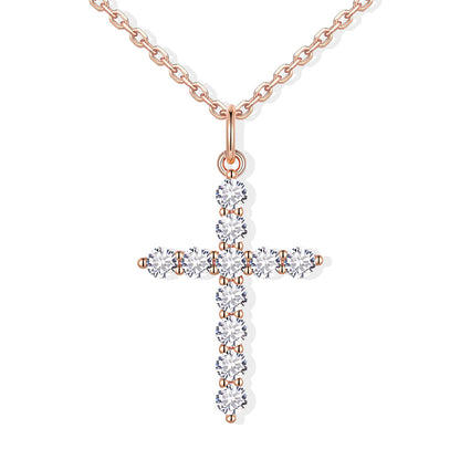 Rose gold cz cross necklace with diamonds on a white background