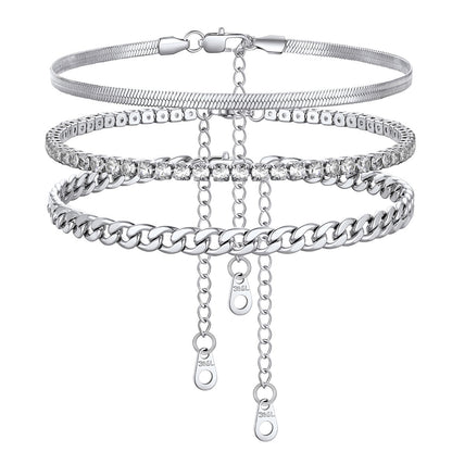 Set of silver bracelets with various designs on a white background