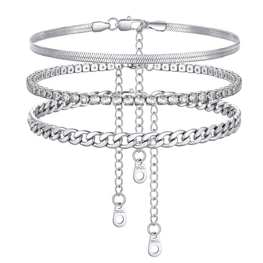 Set of silver bracelets with various designs on a white background