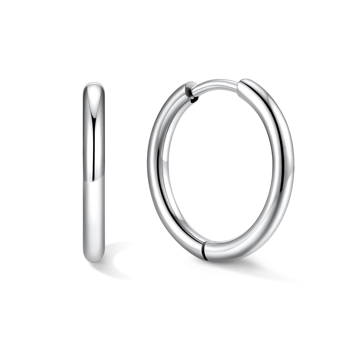 Silver 14mm huggie earrings on a white background
