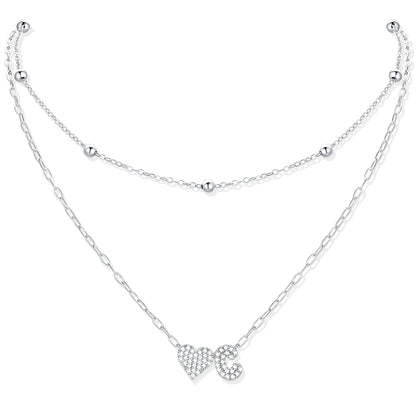 Silver CZ initial C necklace with a heart-shaped pendant on a white background